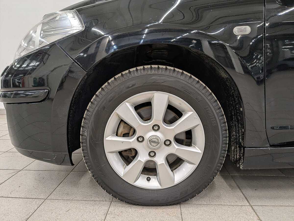 Купить Nissan Tiida с пробегом. Фото: #11