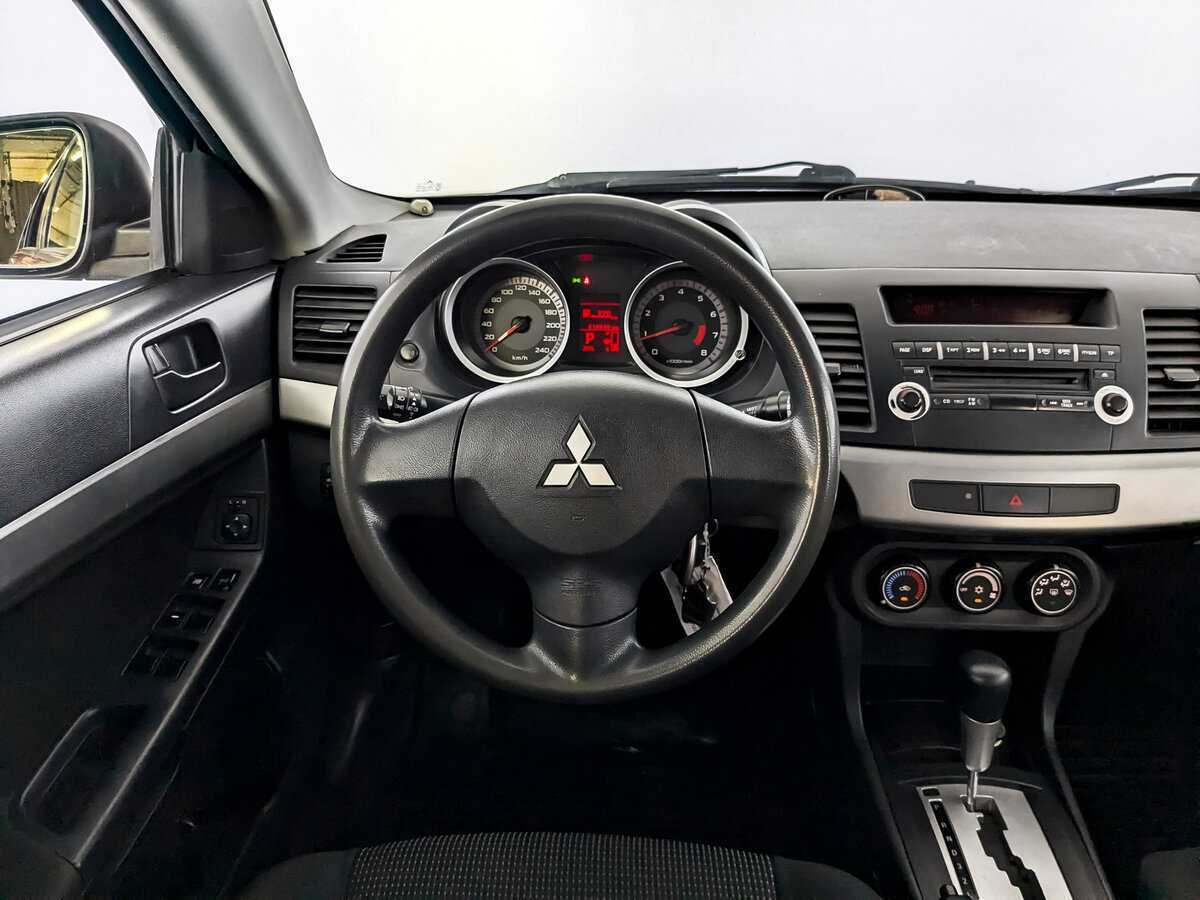 Купить Mitsubishi Lancer с пробегом. Фото: #19