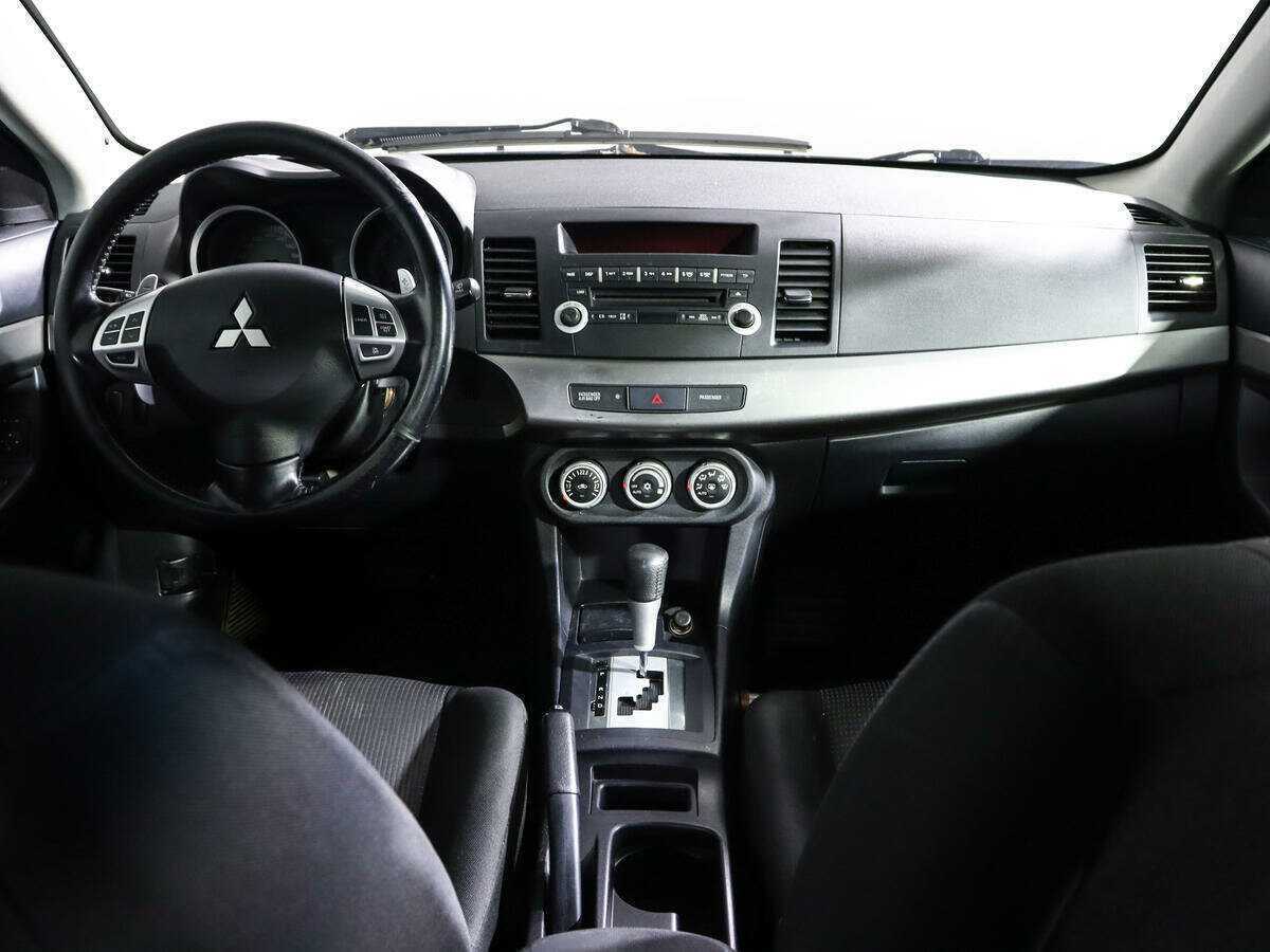 Купить Mitsubishi Lancer с пробегом. Фото: #9