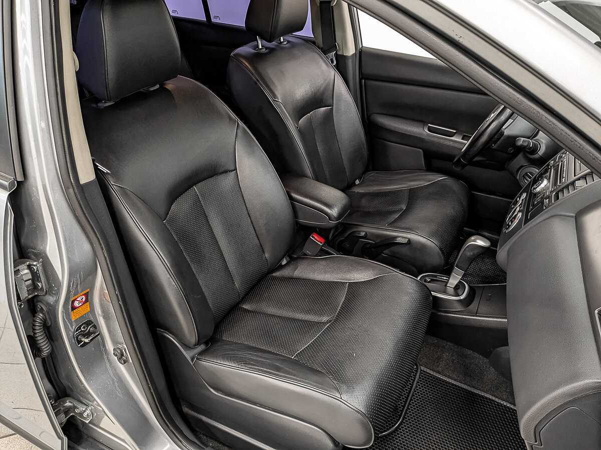 Купить Nissan Tiida с пробегом. Фото: #22