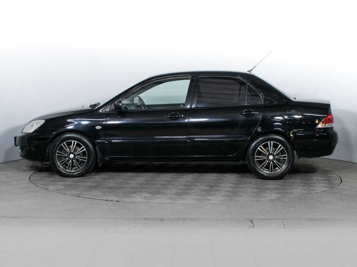 Купить Mitsubishi Lancer с пробегом. Фото: #7