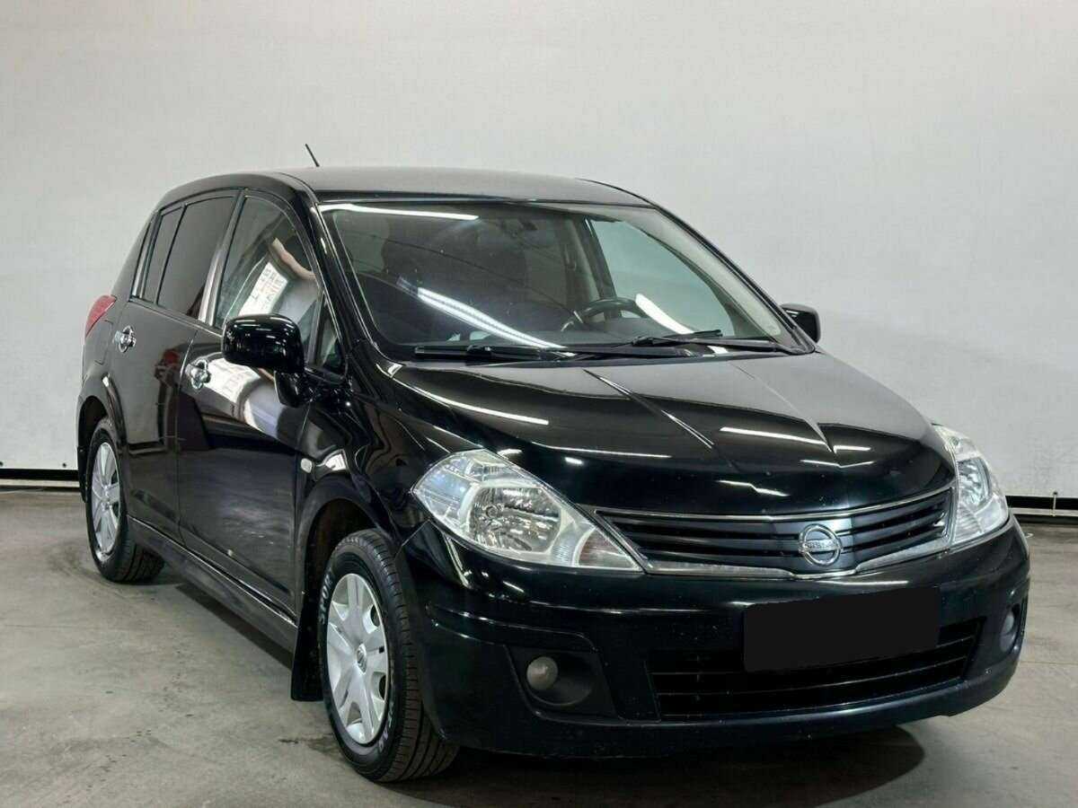 Купить Nissan Tiida с пробегом. Фото: #2