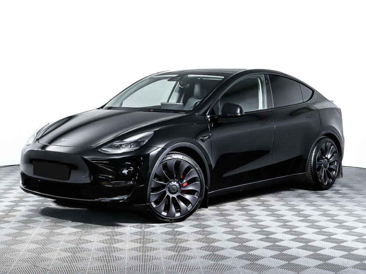 Купить Tesla Model Y с пробегом. Посмотреть фото