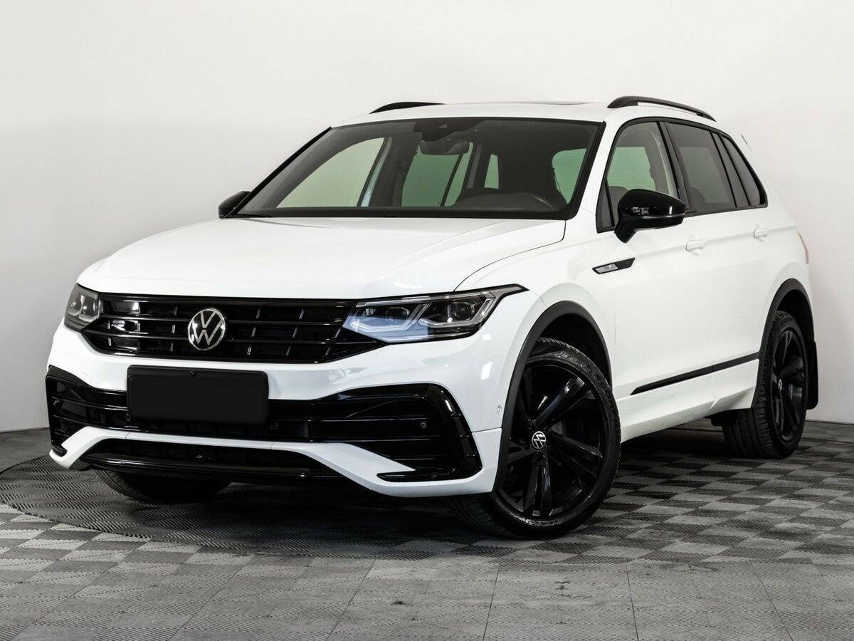 Купить Volkswagen Tiguan с пробегом. Посмотреть фото