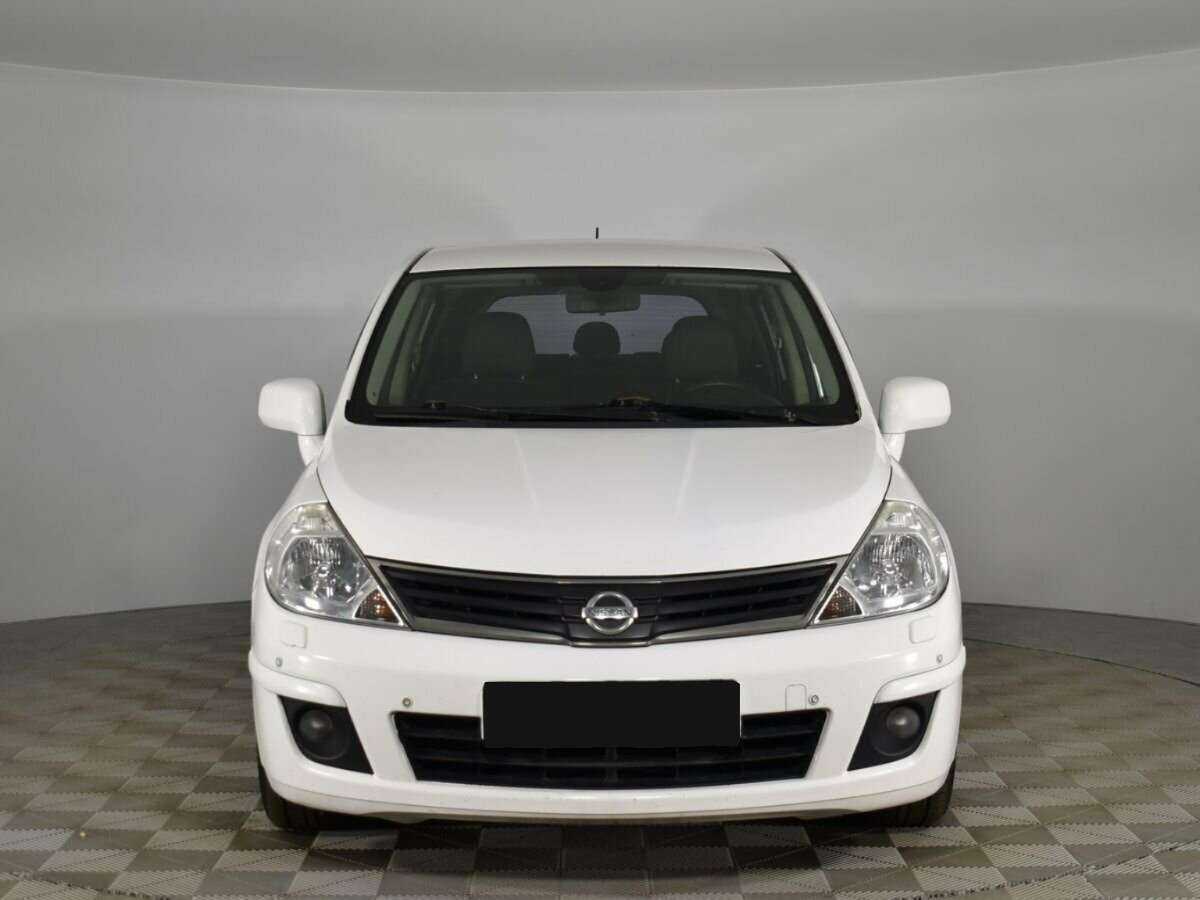 Купить Nissan Tiida с пробегом. Фото: #2