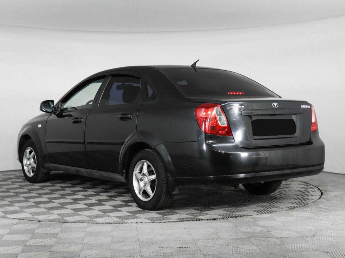 Купить Daewoo Gentra с пробегом. Фото: #3