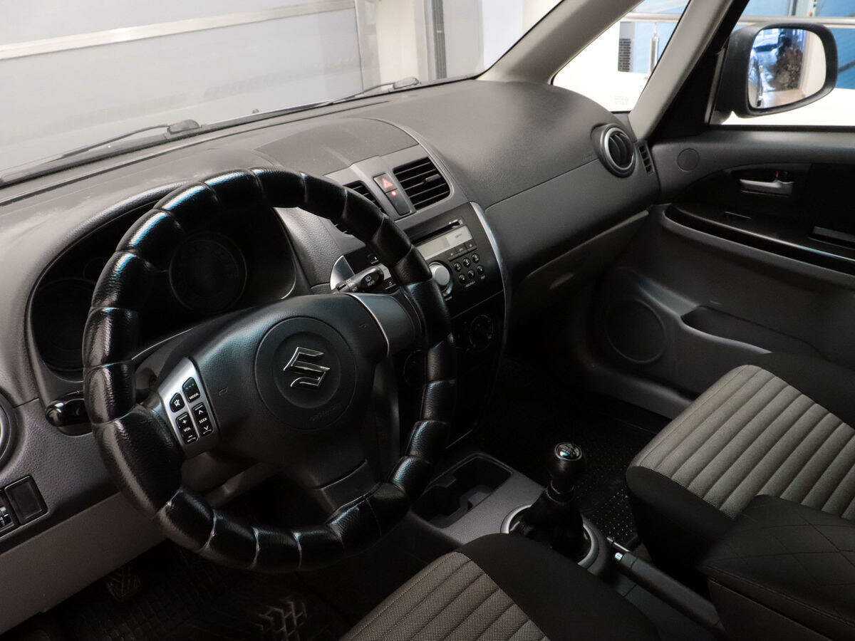 Купить Suzuki SX4 с пробегом. Фото: #8