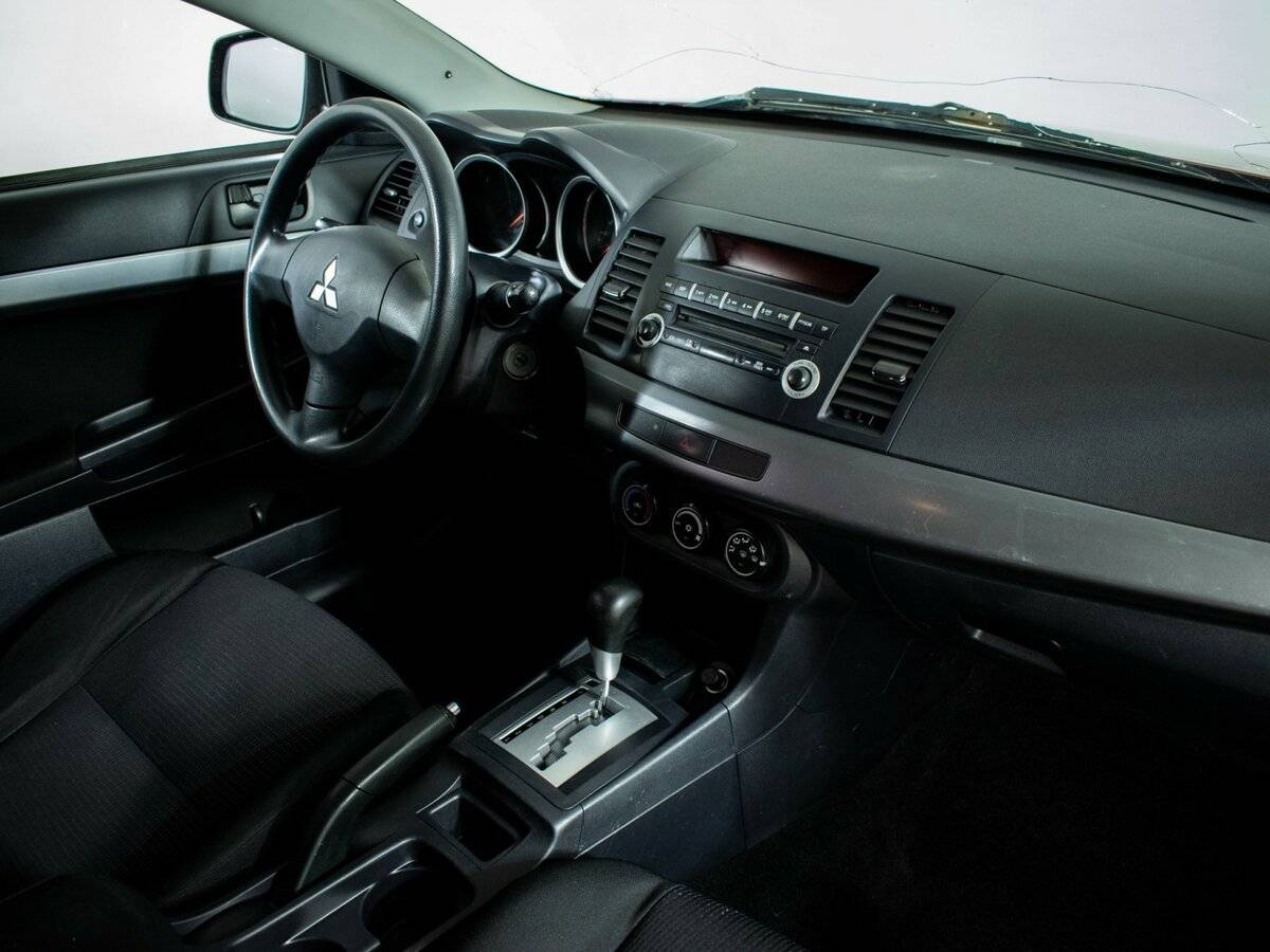 Купить Mitsubishi Lancer с пробегом. Фото: #6