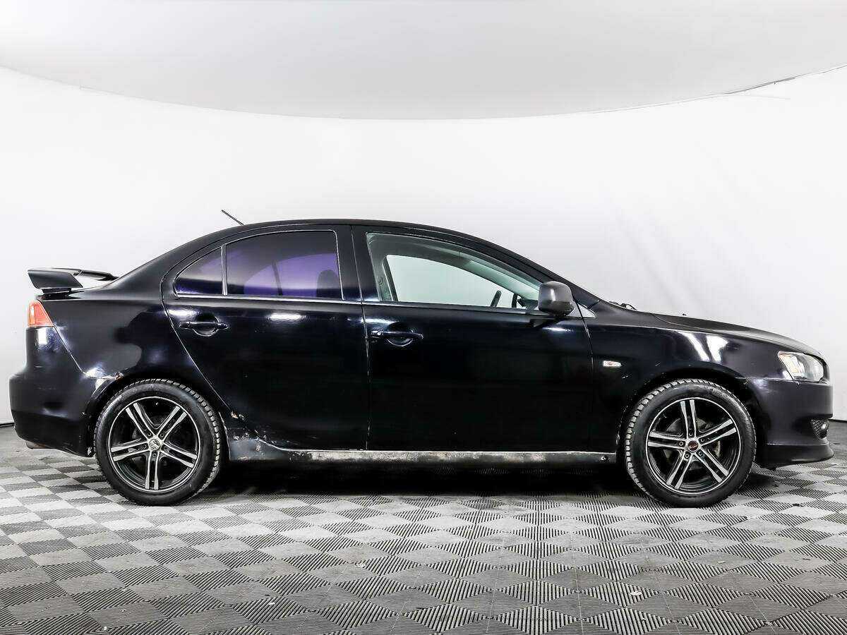 Купить Mitsubishi Lancer с пробегом. Фото: #3