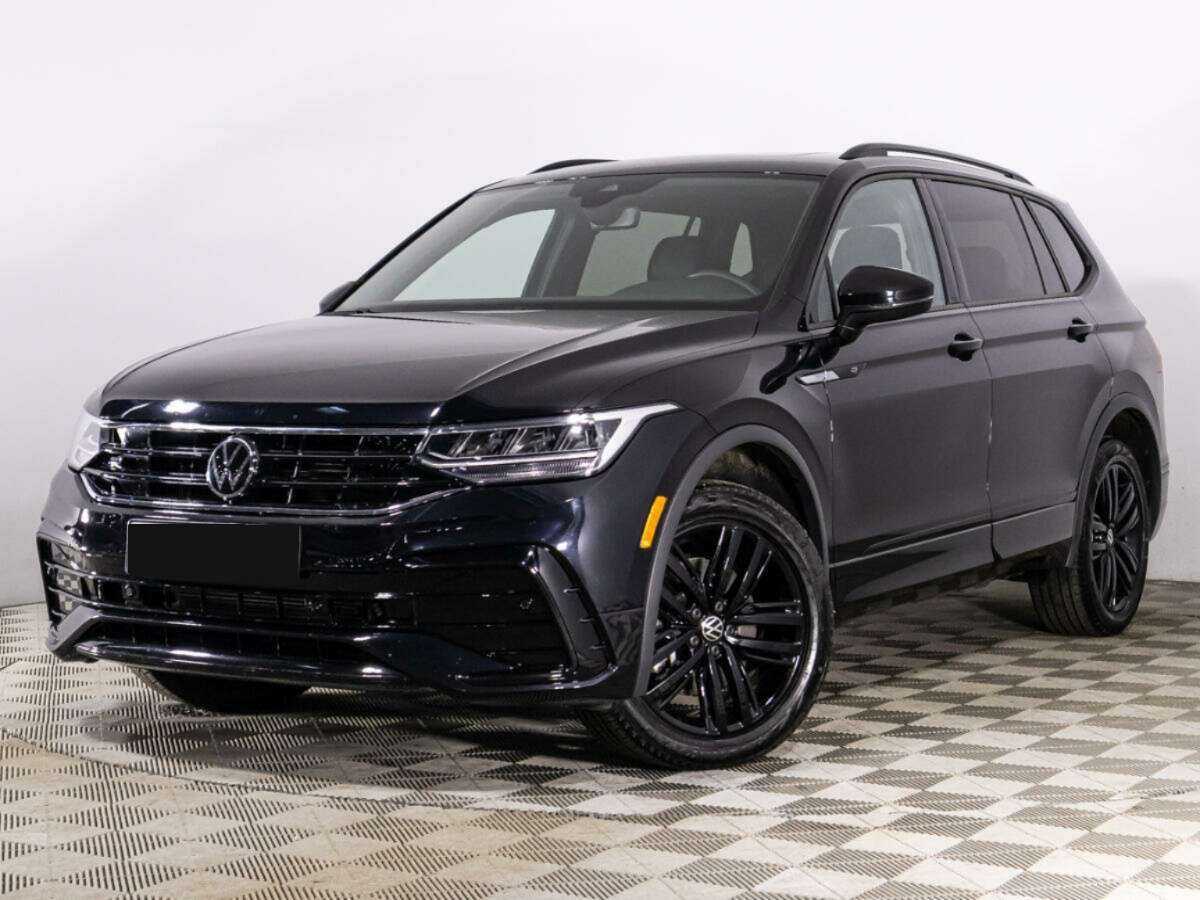 Купить Volkswagen Tiguan с пробегом. Посмотреть фото