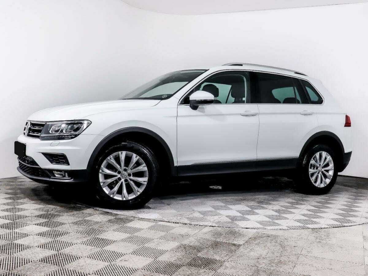 Купить Volkswagen Tiguan с пробегом. Посмотреть фото