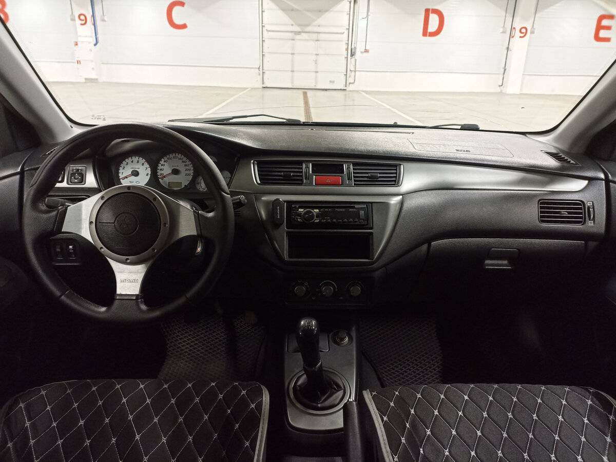 Купить Mitsubishi Lancer с пробегом. Фото: #13