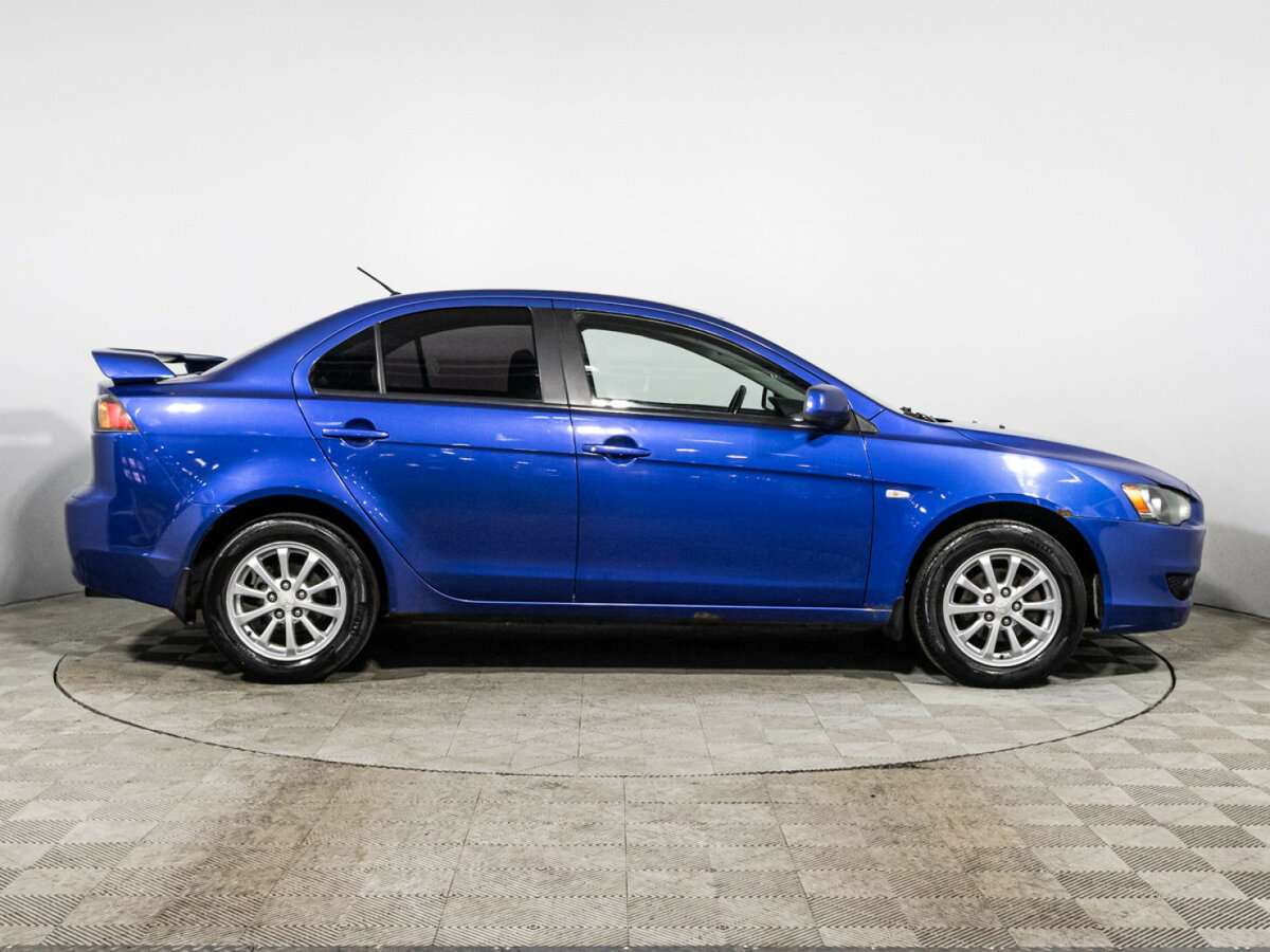Купить Mitsubishi Lancer с пробегом. Фото: #3