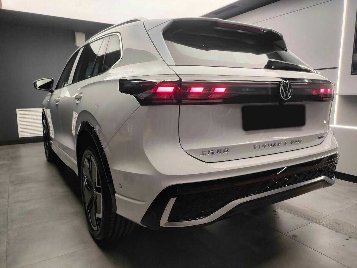 Купить Volkswagen Tiguan с пробегом. Фото: #5