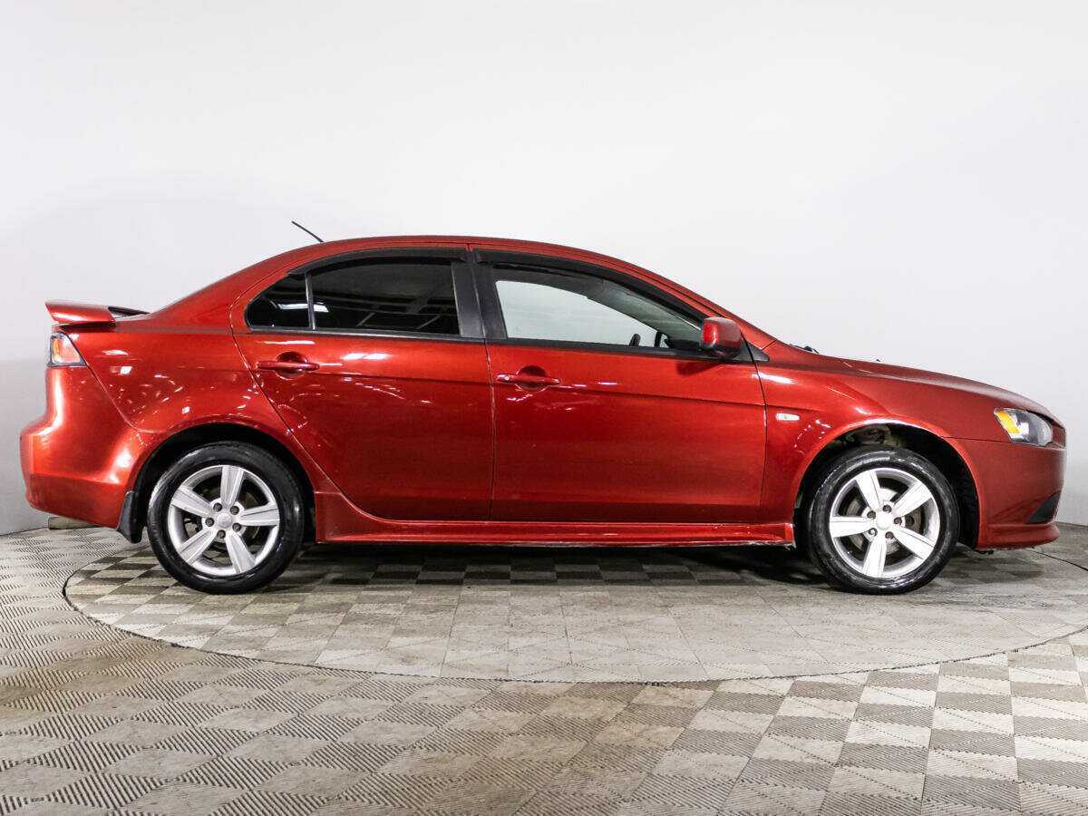 Купить Mitsubishi Lancer с пробегом. Фото: #3