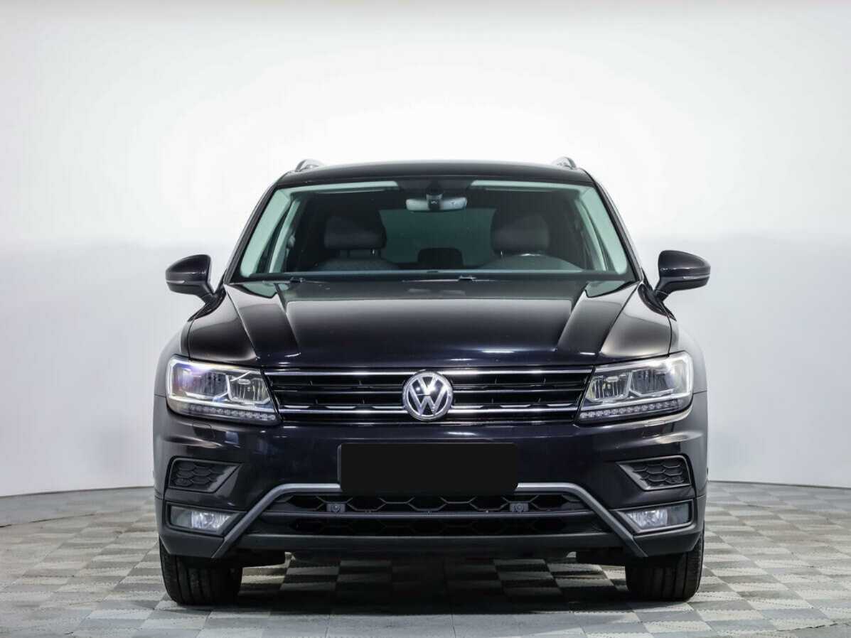 Купить Volkswagen Tiguan с пробегом. Посмотреть фото