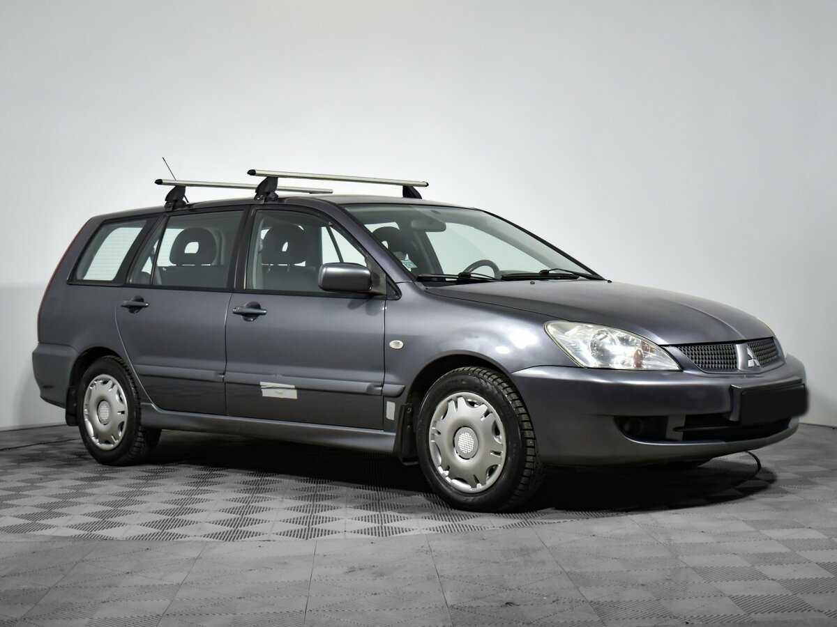 Купить Mitsubishi Lancer с пробегом. Фото: #1