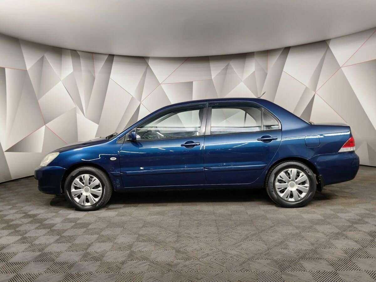 Купить Mitsubishi Lancer с пробегом. Фото: #4