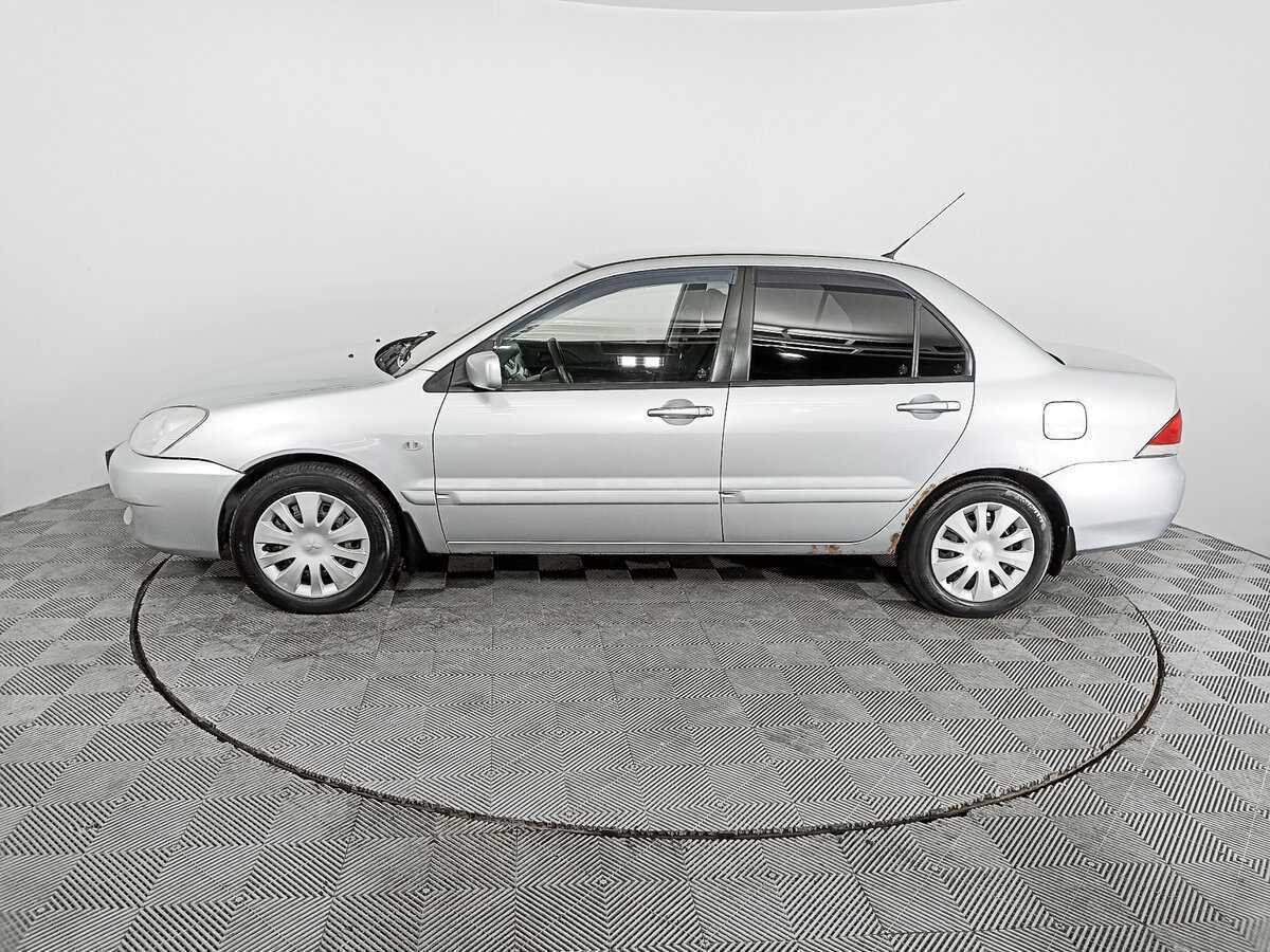 Купить Mitsubishi Lancer с пробегом. Фото: #7