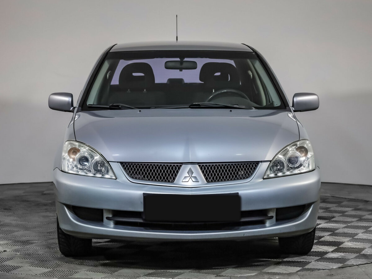 Купить Mitsubishi Lancer с пробегом. Фото: #1