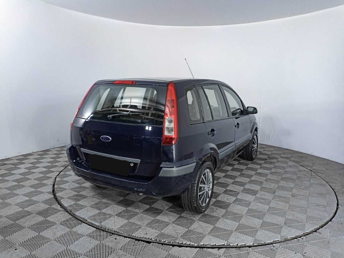 Купить Ford Fusion с пробегом. Фото: #4