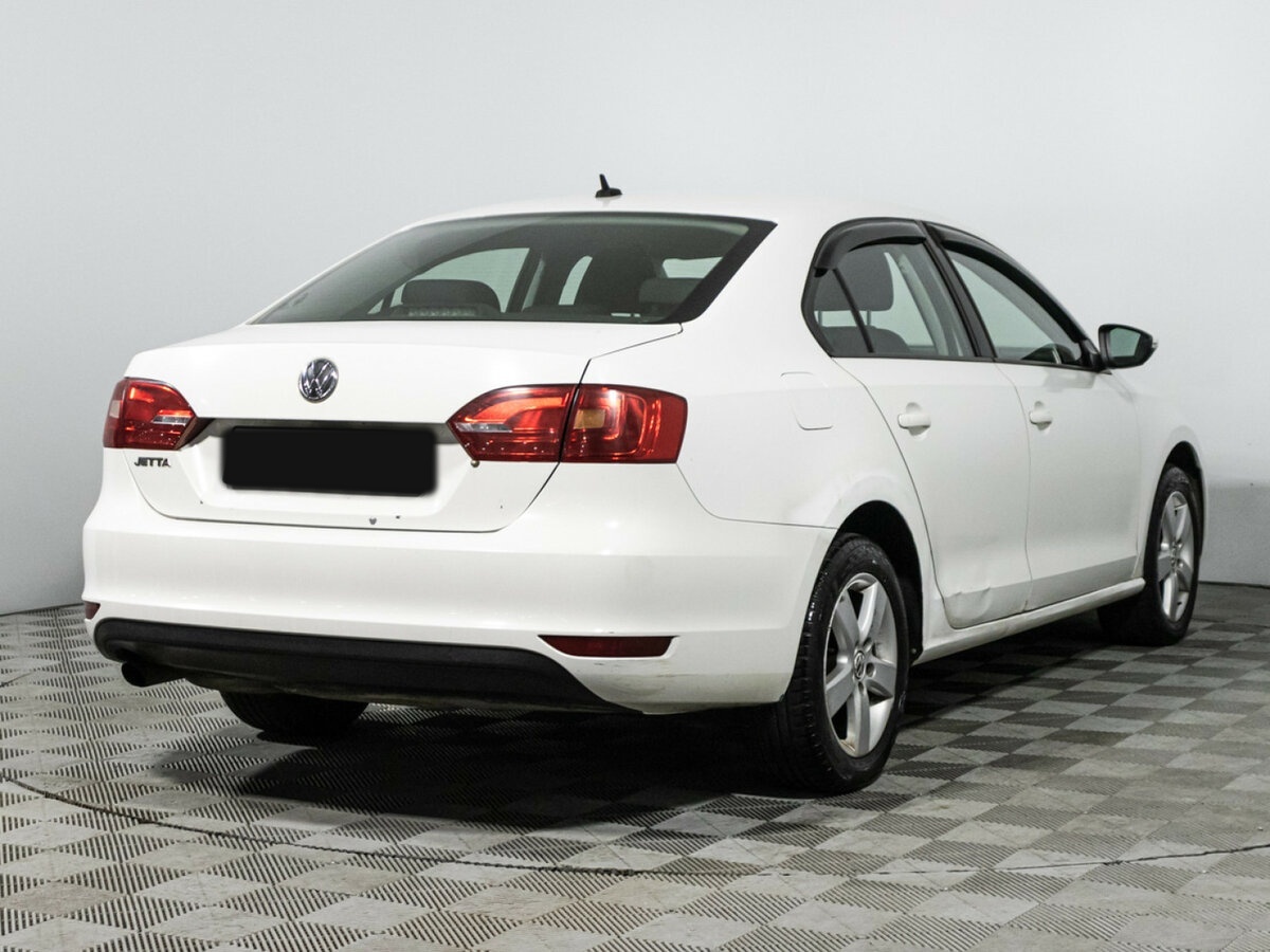 Купить Volkswagen Jetta с пробегом. Фото: #4