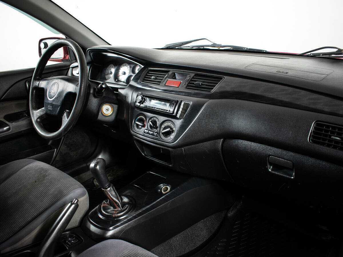 Купить Mitsubishi Lancer с пробегом. Фото: #8