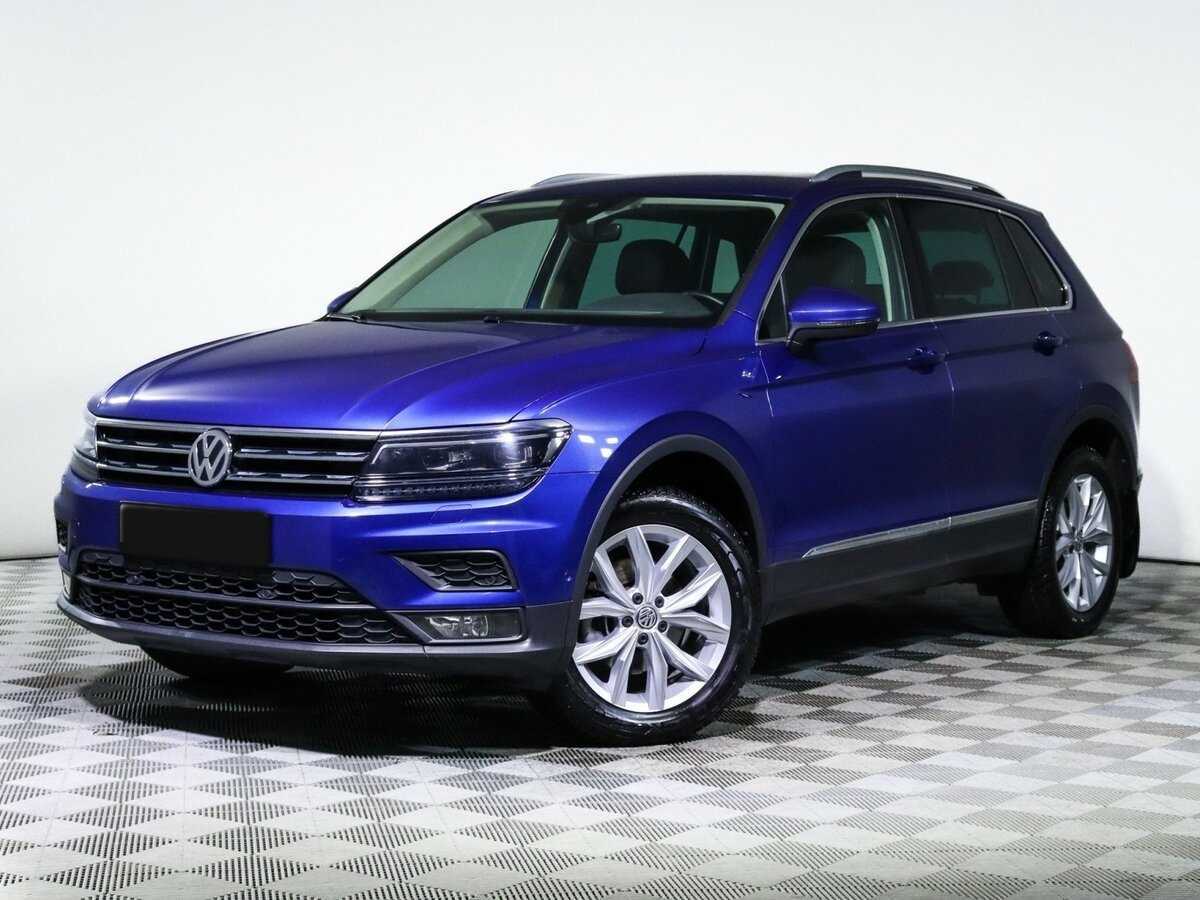 Купить Volkswagen Tiguan с пробегом. Посмотреть фото