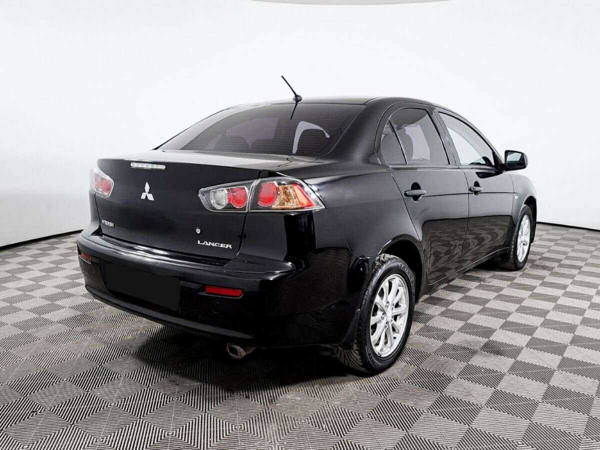 Купить Mitsubishi Lancer с пробегом. Фото: #4