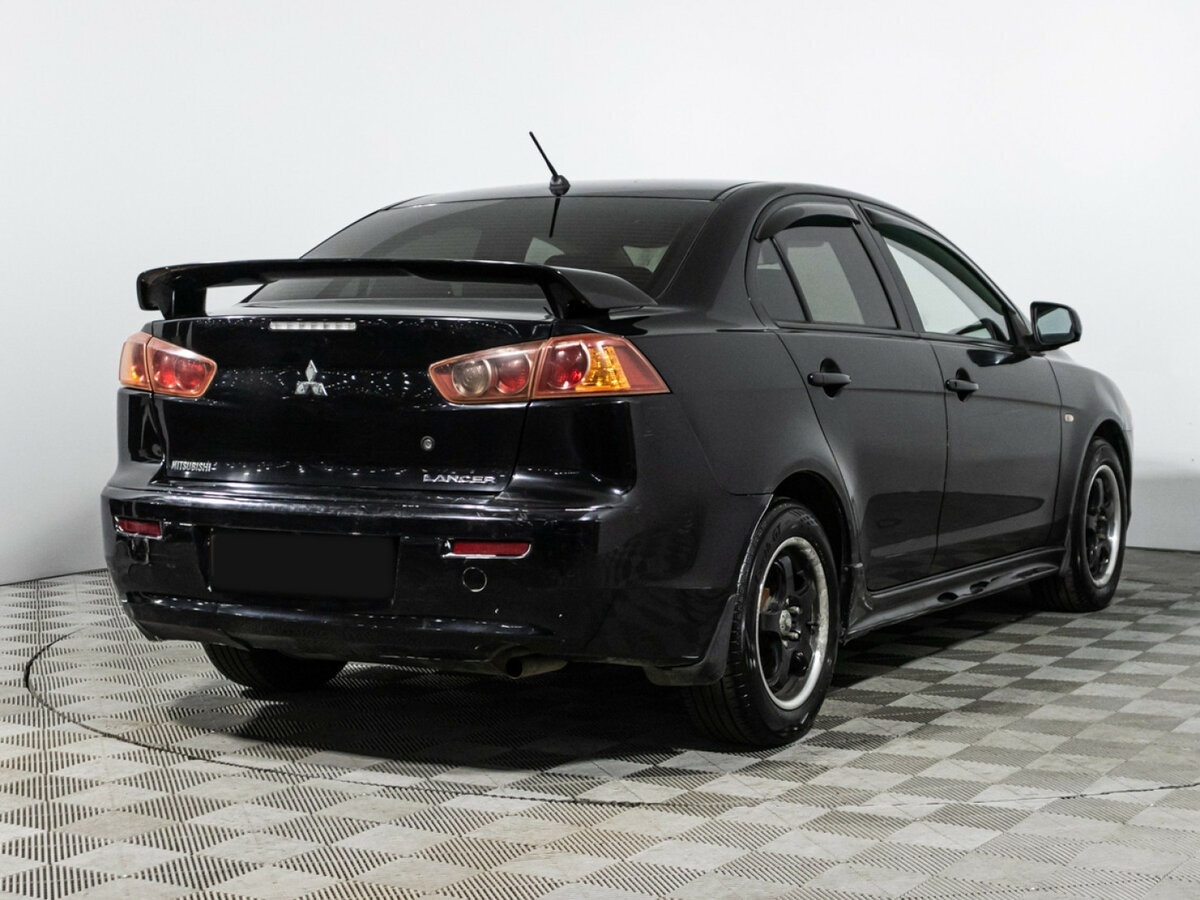 Купить Mitsubishi Lancer с пробегом. Фото: #4
