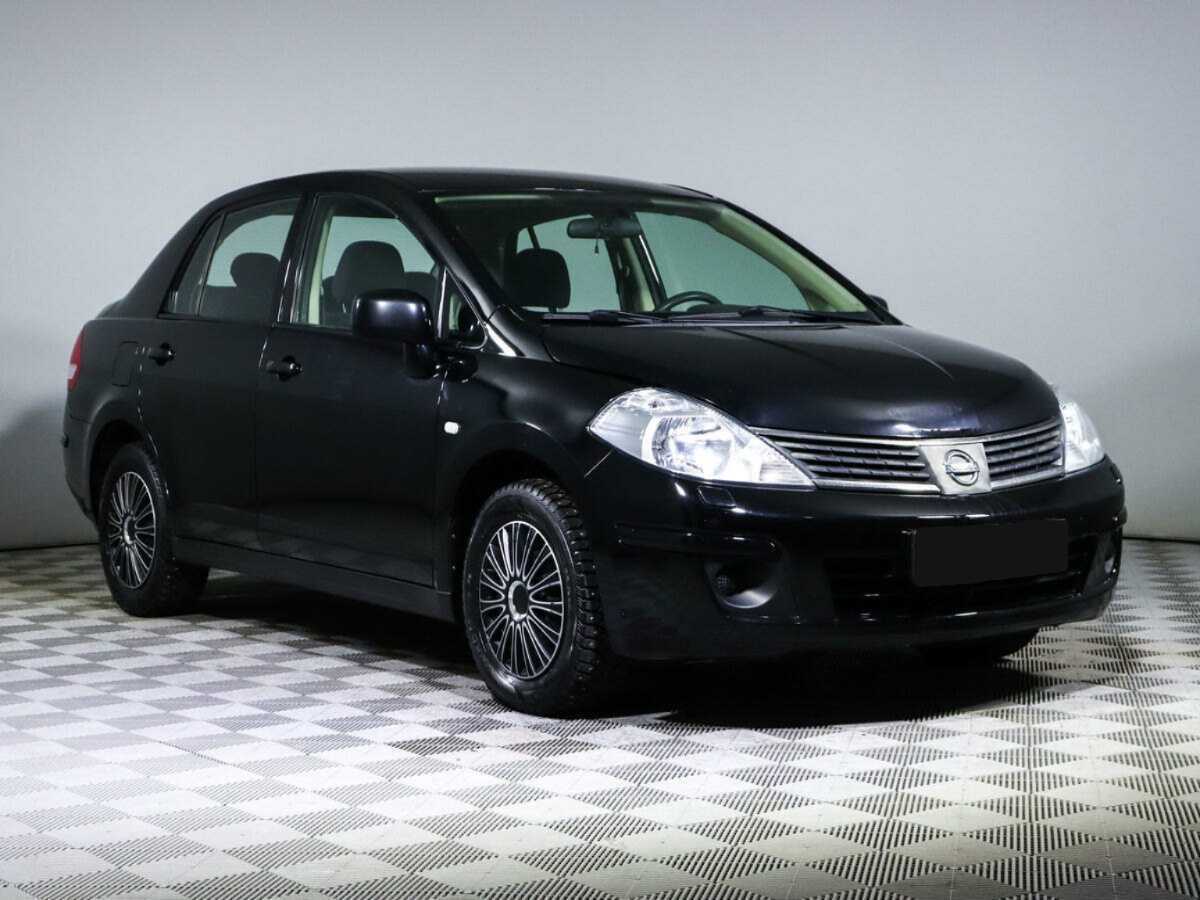 Купить Nissan Tiida с пробегом. Фото: #2