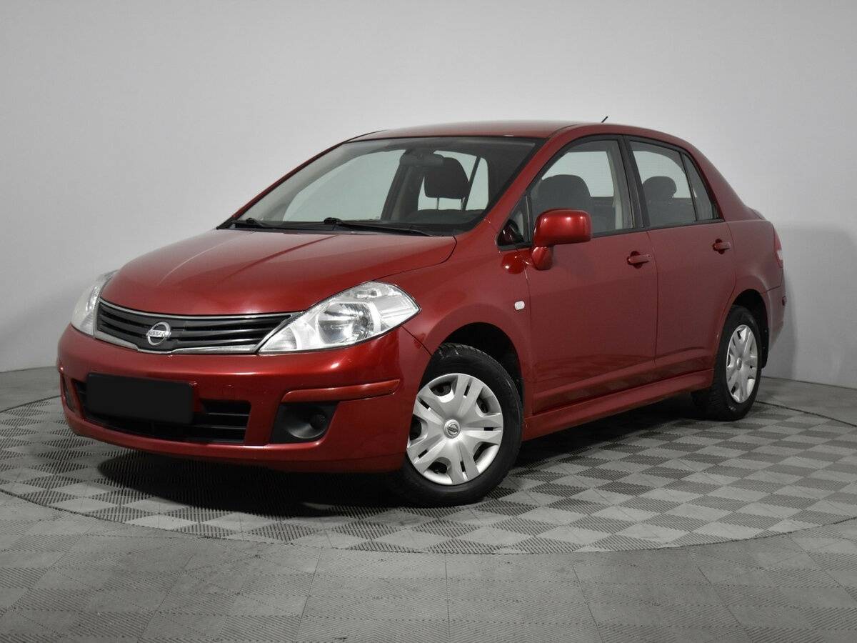 Купить Nissan Tiida с пробегом. Посмотреть фото
