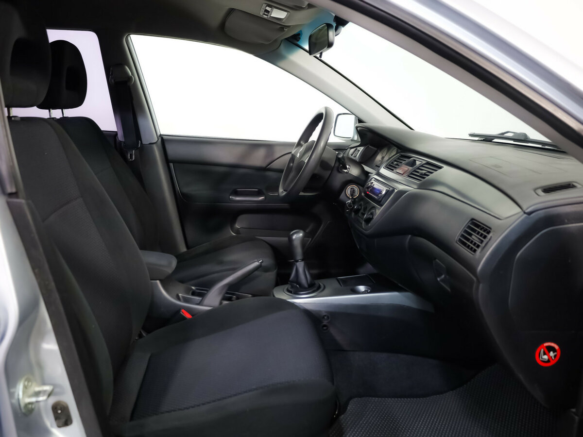 Купить Mitsubishi Lancer с пробегом. Фото: #15
