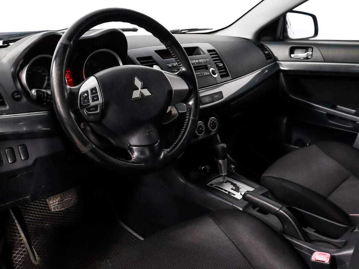 Купить Mitsubishi Lancer с пробегом. Фото: #8