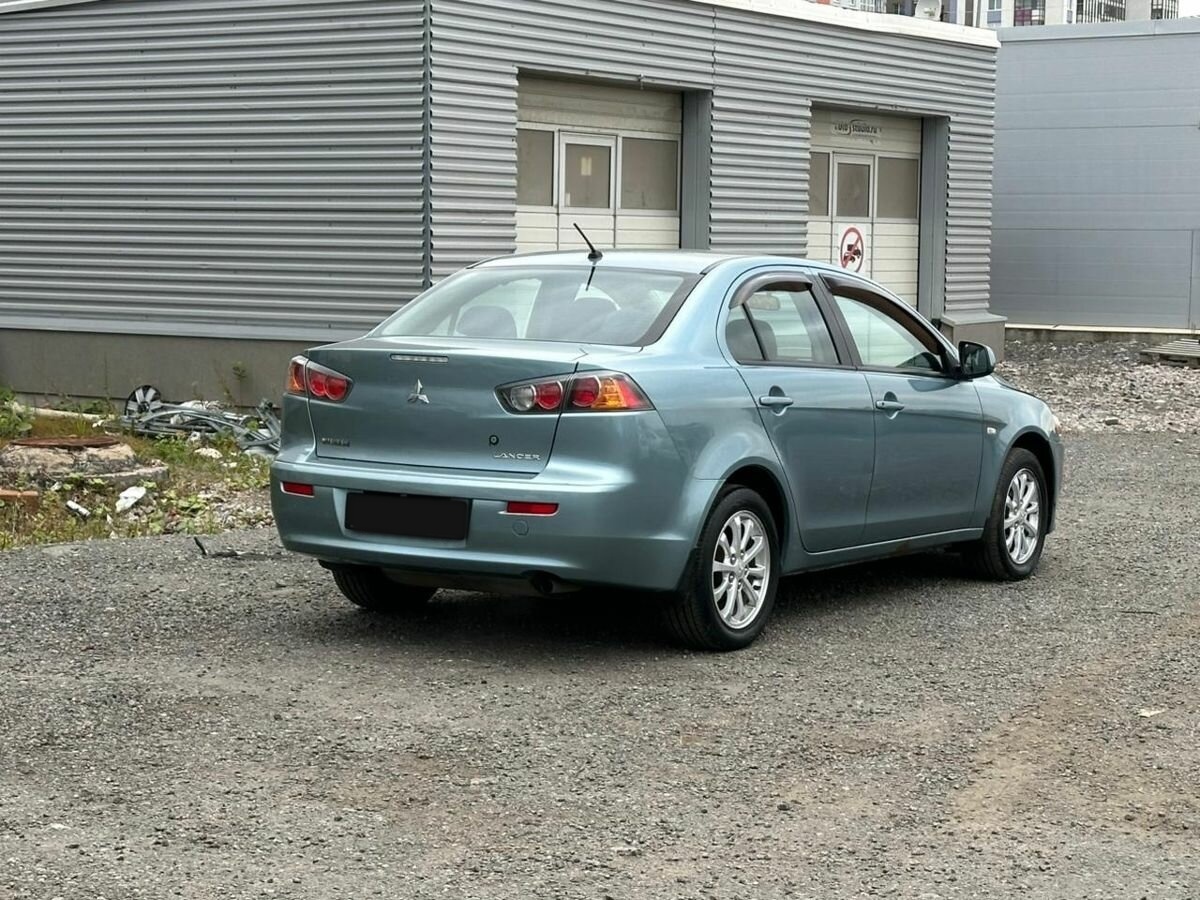 Купить Mitsubishi Lancer с пробегом. Фото: #2