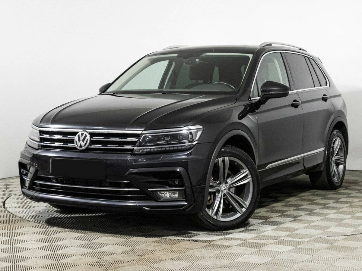 Купить Volkswagen Tiguan с пробегом. Посмотреть фото