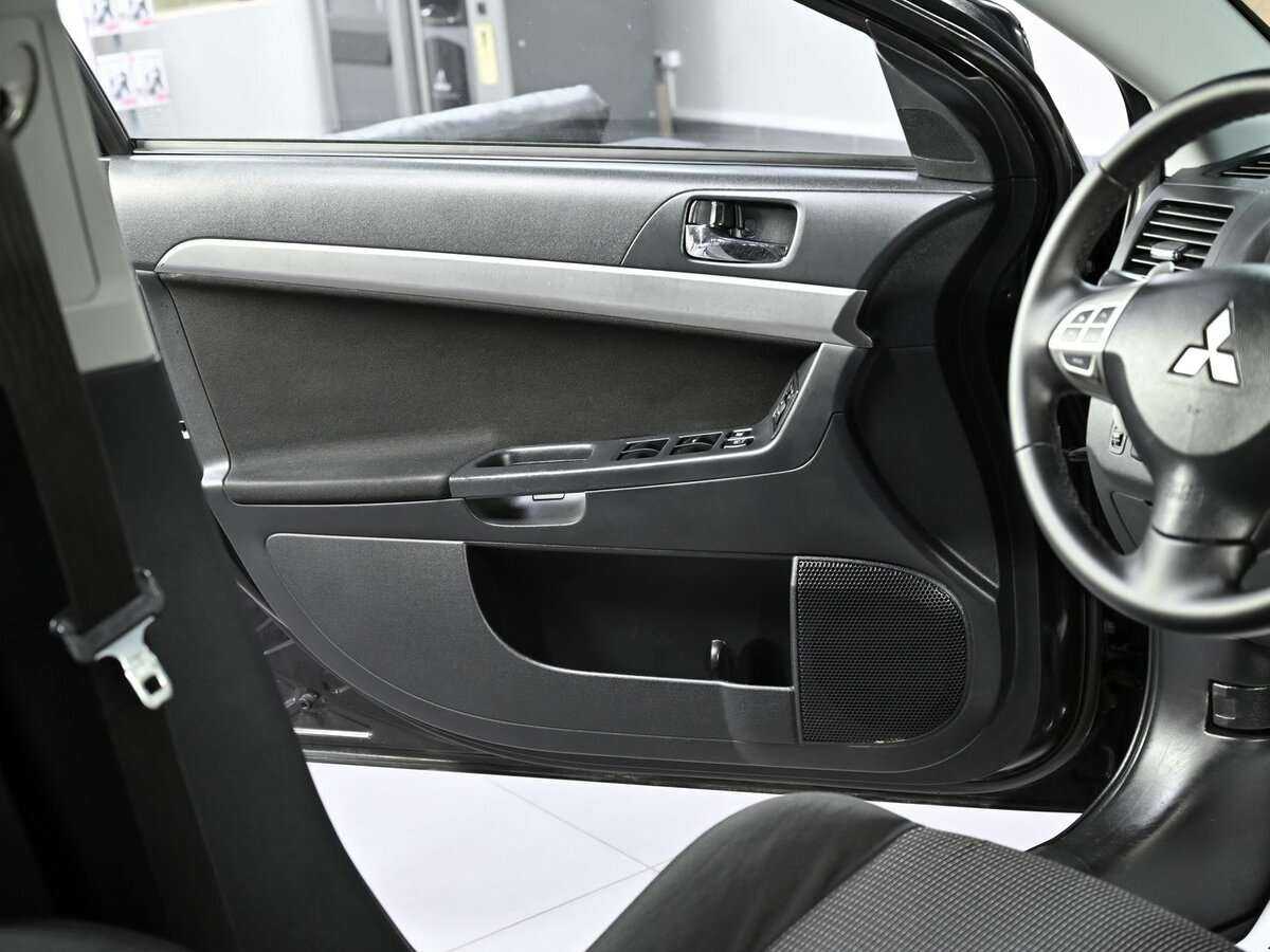 Купить Mitsubishi Lancer с пробегом. Фото: #6