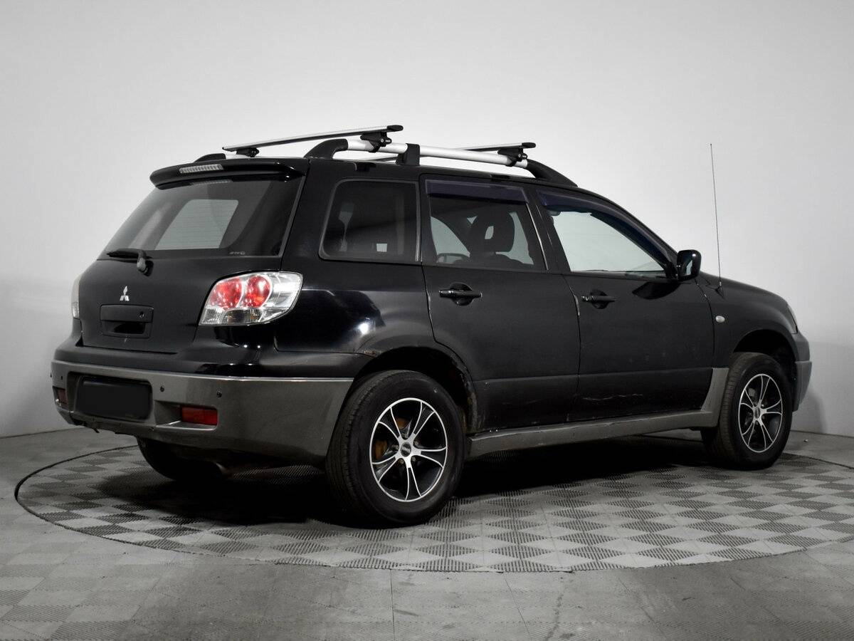 Купить Mitsubishi Outlander с пробегом. Фото: #3