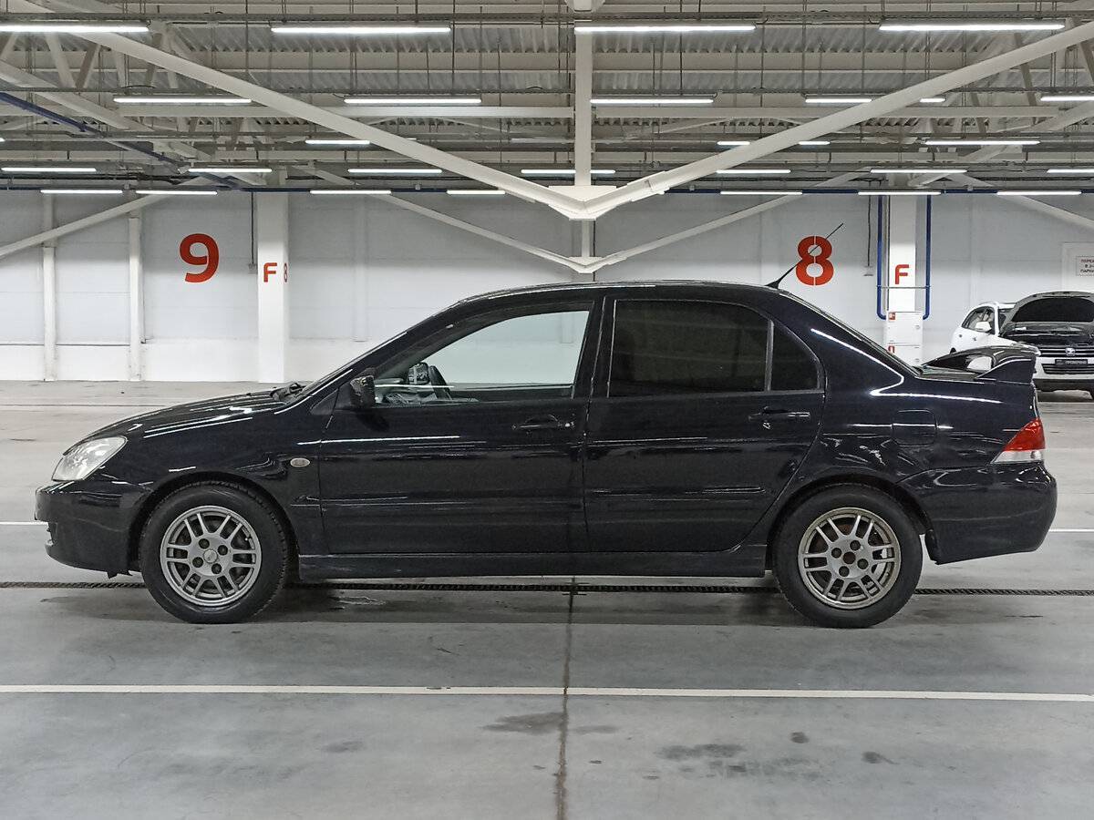 Купить Mitsubishi Lancer с пробегом. Фото: #7
