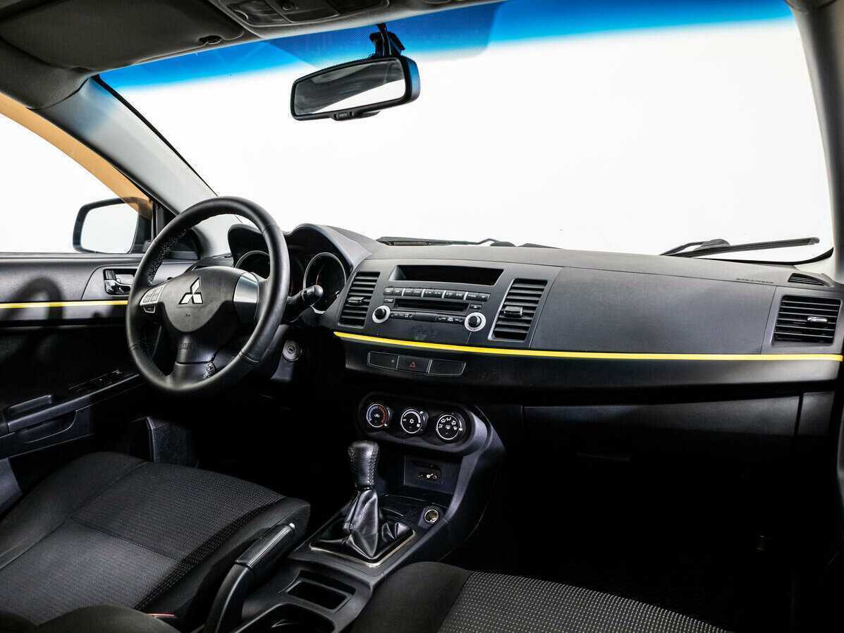 Купить Mitsubishi Lancer с пробегом. Фото: #6
