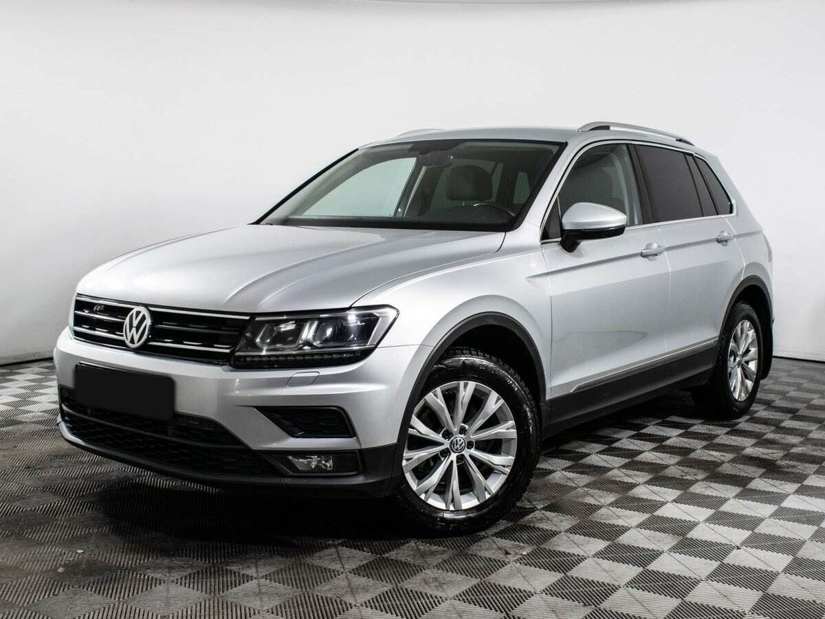 Купить Volkswagen Tiguan с пробегом. Посмотреть фото