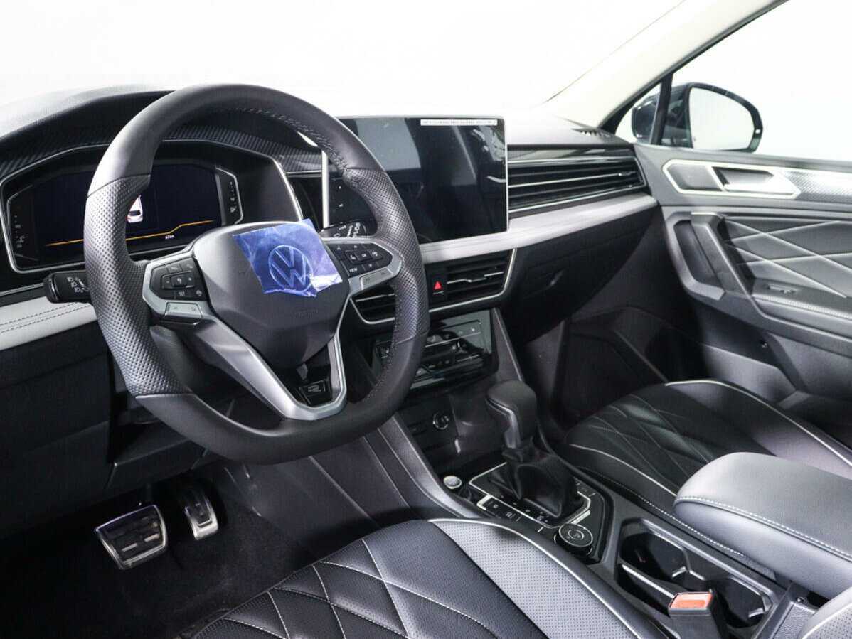 Купить Volkswagen Tiguan с пробегом. Фото: #11