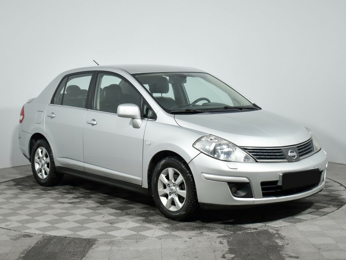 Купить Nissan Tiida с пробегом. Фото: #2