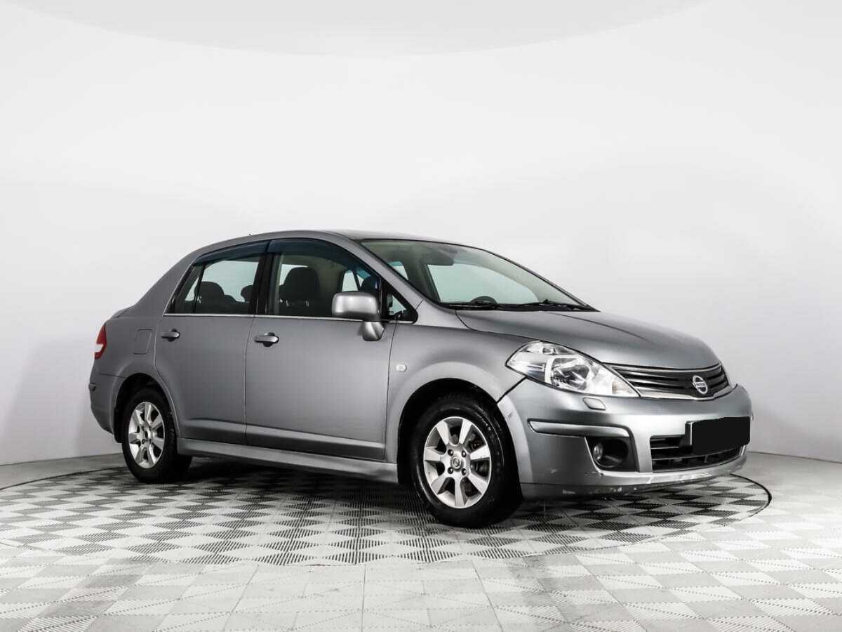 Купить Nissan Tiida с пробегом. Фото: #2