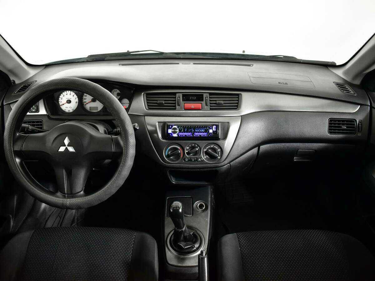 Купить Mitsubishi Lancer с пробегом. Фото: #11