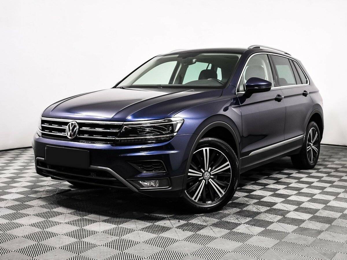Купить Volkswagen Tiguan с пробегом. Посмотреть фото