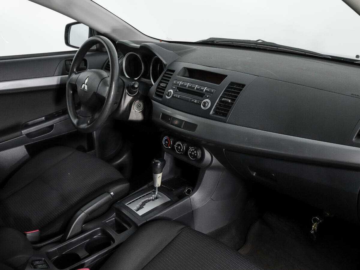 Купить Mitsubishi Lancer с пробегом. Фото: #10