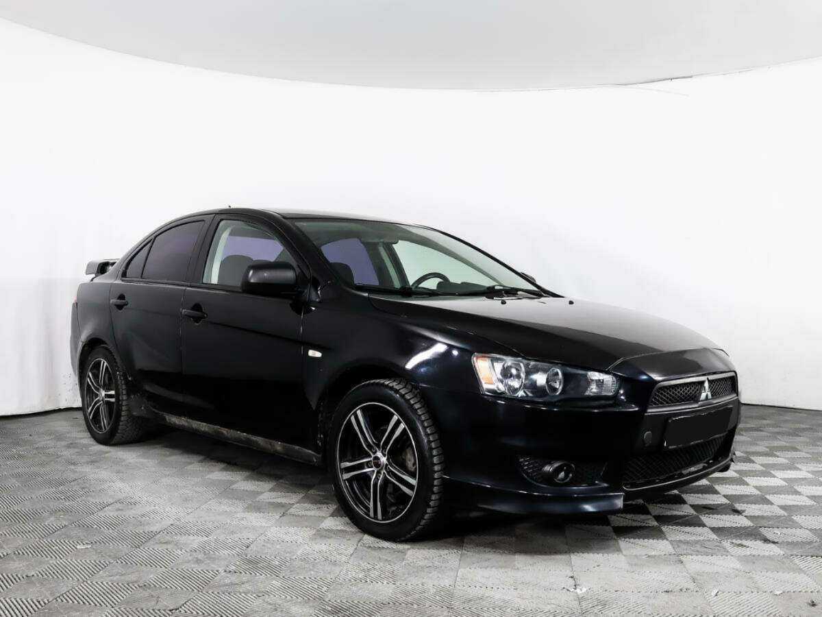 Купить Mitsubishi Lancer с пробегом. Фото: #2