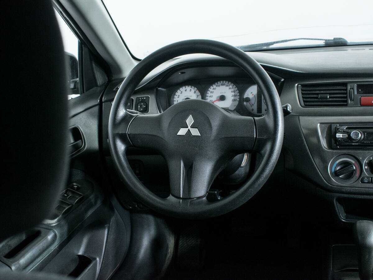 Купить Mitsubishi Lancer с пробегом. Фото: #13