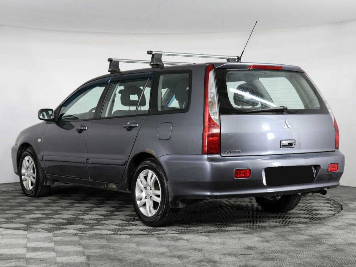 Купить Mitsubishi Lancer с пробегом. Фото: #3